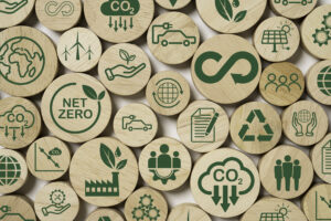 infinity and Circular business economy environment icons print screen on wooden for future sustainable investment growth and reduce environmental pollution concept.
